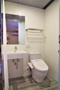 Vannituba majutusasutuses Dahshin Hotel