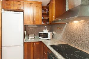 Kuchyň nebo kuchyňský kout v ubytování Lets Holidays apartment Tarull