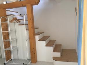 Palanda nebo palandy na pokoji v ubytování La Era