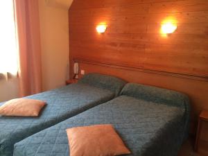 Postel nebo postele na pokoji v ubytování Le Marboré