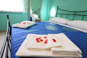 Postel nebo postele na pokoji v ubytování B&b VerdeMare Camerota