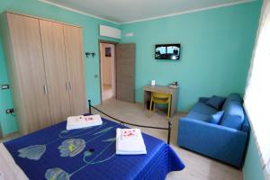 Postel nebo postele na pokoji v ubytování B&b VerdeMare Camerota