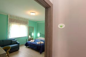 Postel nebo postele na pokoji v ubytování B&b VerdeMare Camerota