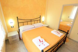 Postel nebo postele na pokoji v ubytování B&b VerdeMare Camerota
