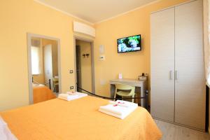 Postel nebo postele na pokoji v ubytování B&b VerdeMare Camerota