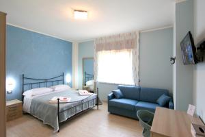 Postel nebo postele na pokoji v ubytování B&b VerdeMare Camerota