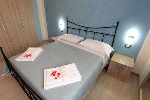 Postel nebo postele na pokoji v ubytování B&b VerdeMare Camerota