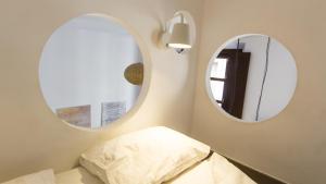 Postel nebo postele na pokoji v ubytování Apartamentos Málaga Picasso