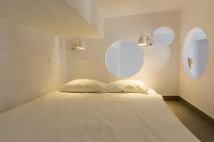 Postel nebo postele na pokoji v ubytování Apartamentos Málaga Picasso