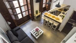 Kuchyň nebo kuchyňský kout v ubytování Apartamentos Málaga Picasso
