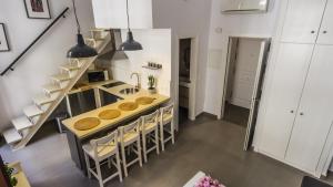 Kuchyň nebo kuchyňský kout v ubytování Apartamentos Málaga Picasso