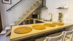 Kuchyň nebo kuchyňský kout v ubytování Apartamentos Málaga Picasso