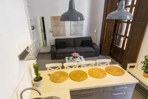 Kuchyň nebo kuchyňský kout v ubytování Apartamentos Málaga Picasso