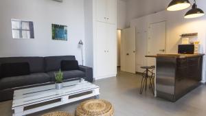 Posezení v ubytování Apartamentos Málaga Picasso