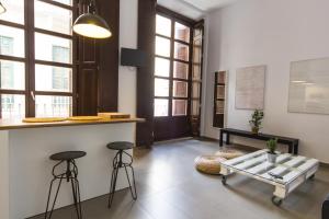 Posezení v ubytování Apartamentos Málaga Picasso