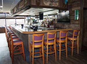 Lounge alebo bar v ubytovaní Windjammer Motor Inn