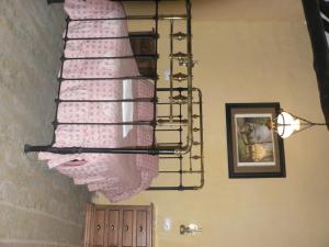 A bed or beds in a room at Cortijo la Colá
