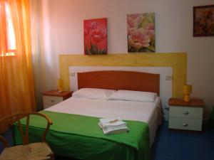 Voodi või voodid majutusasutuse Casa Vacanze Guardamare toas