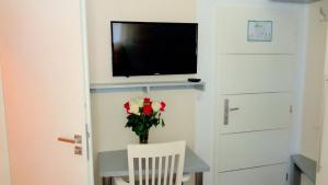 TV a/nebo společenská místnost v ubytování Hotel Stadt Soltau