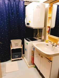 Ванная комната в Guest House Waraemon