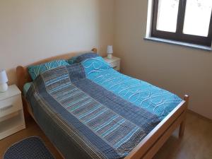 Rúm í herbergi á Apartment Stanko