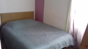 Postel nebo postele na pokoji v ubytování L'as Gourmand