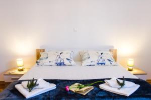 Posteľ alebo postele v izbe v ubytovaní Dundo Baldo Apartment
