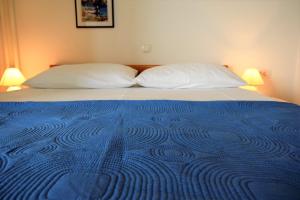 Posteľ alebo postele v izbe v ubytovaní Sunnyy Beacch Apartments