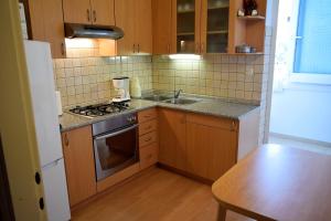 Kuchyňa alebo kuchynka v ubytovaní Sunnyy Beacch Apartments