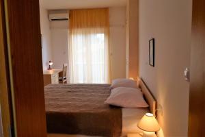 Posteľ alebo postele v izbe v ubytovaní Sunnyy Beacch Apartments