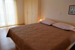 Posteľ alebo postele v izbe v ubytovaní Sunnyy Beacch Apartments