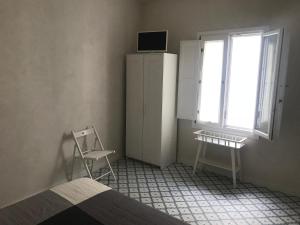 TV a/nebo společenská místnost v ubytování Casa e Bottega