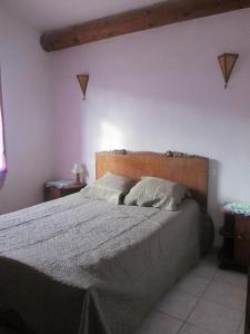 Postel nebo postele na pokoji v ubytování Gîtes des Cèdres