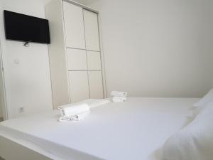 Postel nebo postele na pokoji v ubytování Apartments Vinko