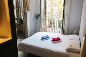 Postel nebo postele na pokoji v ubytování ZOOROOMS Boutique Guesthouse + 37 fotografií