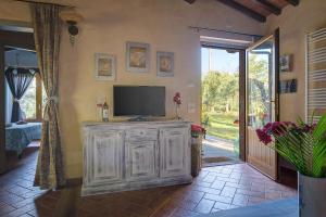 A television and/or entertainment centre at Tuscan Roots