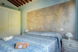 A bed or beds in a room at Tuscan Roots