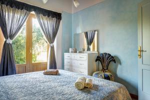 A bed or beds in a room at Tuscan Roots