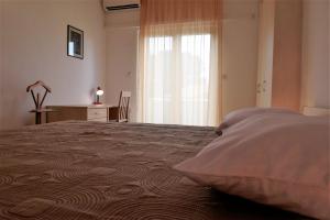 Posteľ alebo postele v izbe v ubytovaní Sunnyy Beacch Apartments