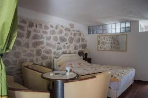 Postel nebo postele na pokoji v ubytování Apartments Subotic
