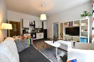A television and/or entertainment centre at GOOD(wo)MAN'S HOME I