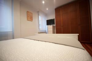 A bed or beds in a room at Calle Río de la Pila