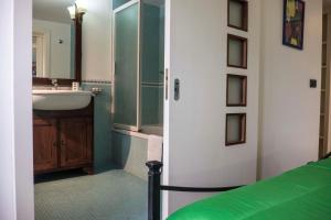 a bathroom with a sink and a shower and a toilet at Dream House Duomo Catania in Catania +21 photos