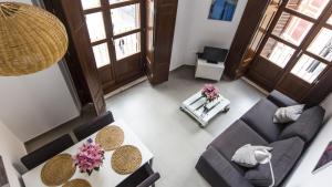 Posezení v ubytování Apartamentos Málaga Picasso