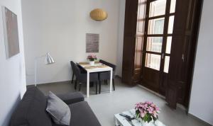 Posezení v ubytování Apartamentos Málaga Picasso