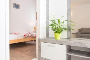 Posteľ alebo postele v izbe v ubytovaní Apartments Cekada