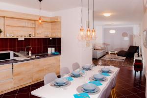 Kuchyňa alebo kuchynka v ubytovaní Nexus Apartmenthotel