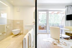 Un baño de Hotel Lün