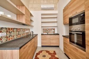 Kjøkken eller kjøkkenkrok på Zoe 2 by Vallettastay + 15 bilder