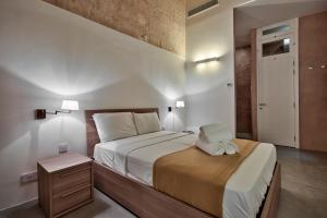 En eller flere senger på et rom på Zoe 2 by Vallettastay